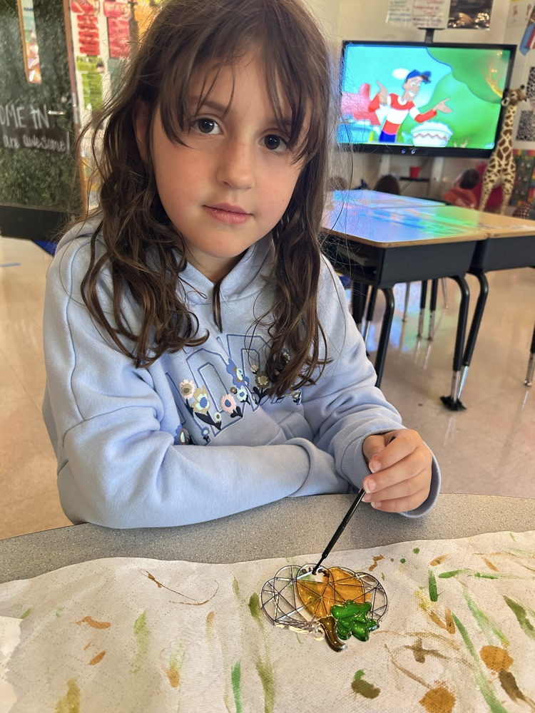 student learning about pumpkins