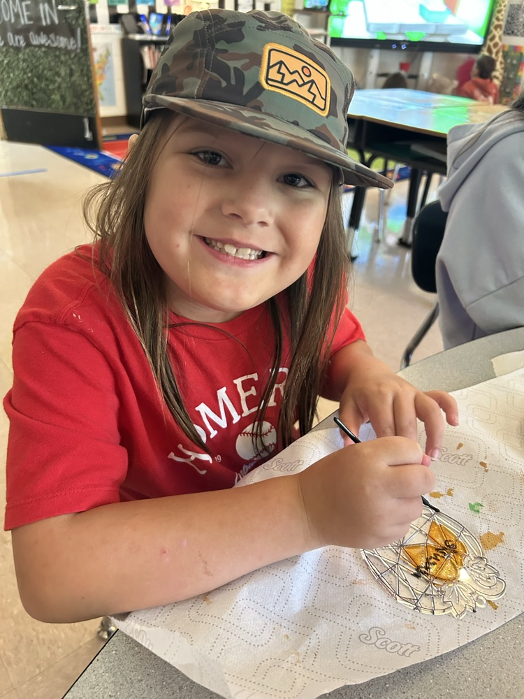 student learning about pumpkins