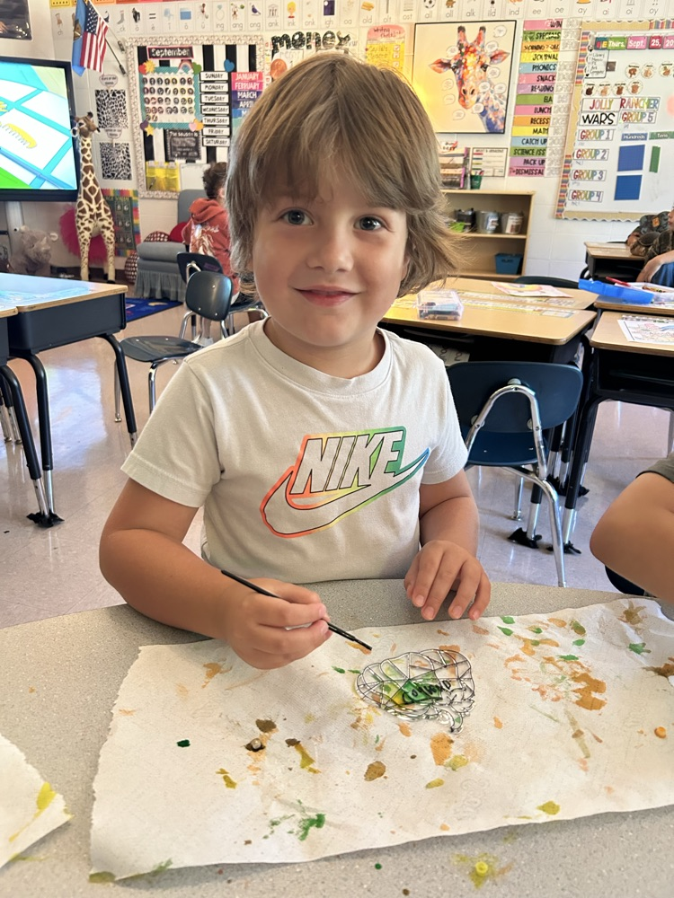 student learning about pumpkins