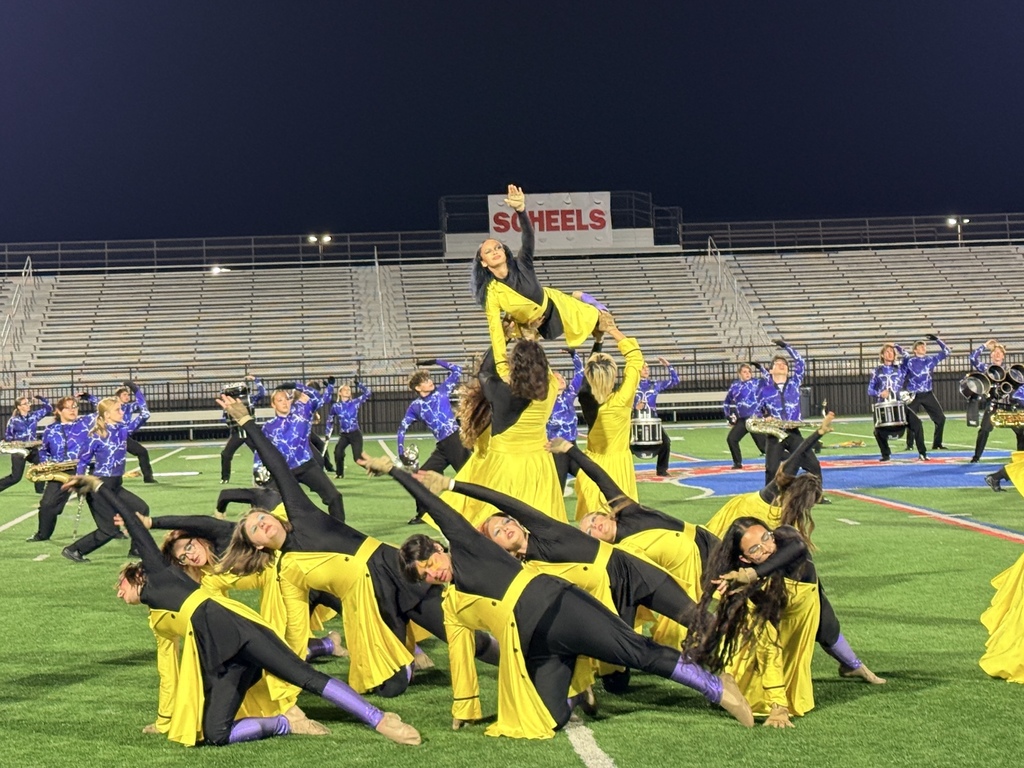 color guard in black and white costumes