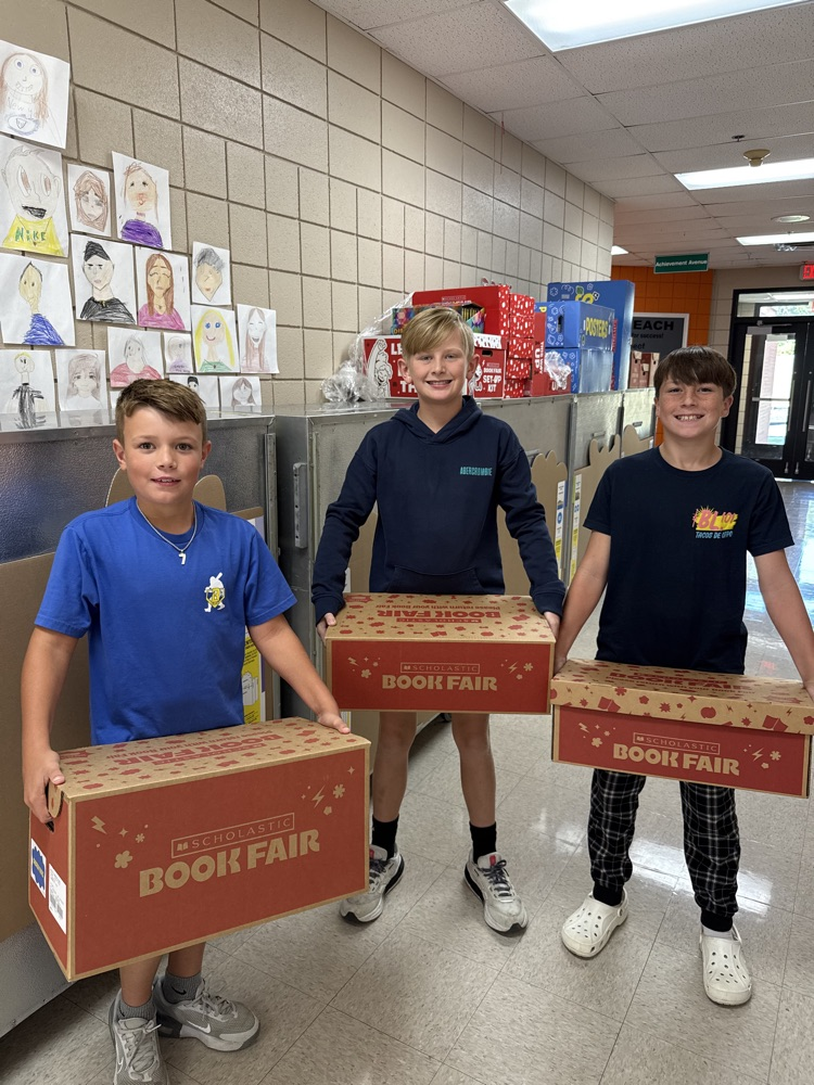 students helping with book fair