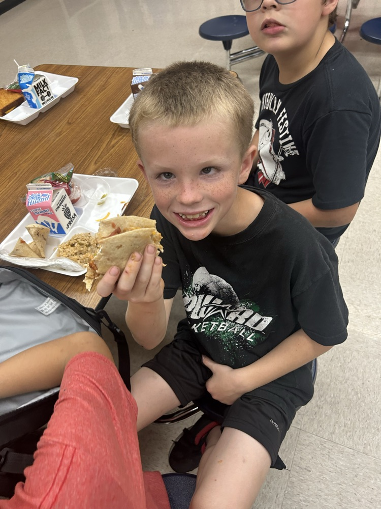 student with taco