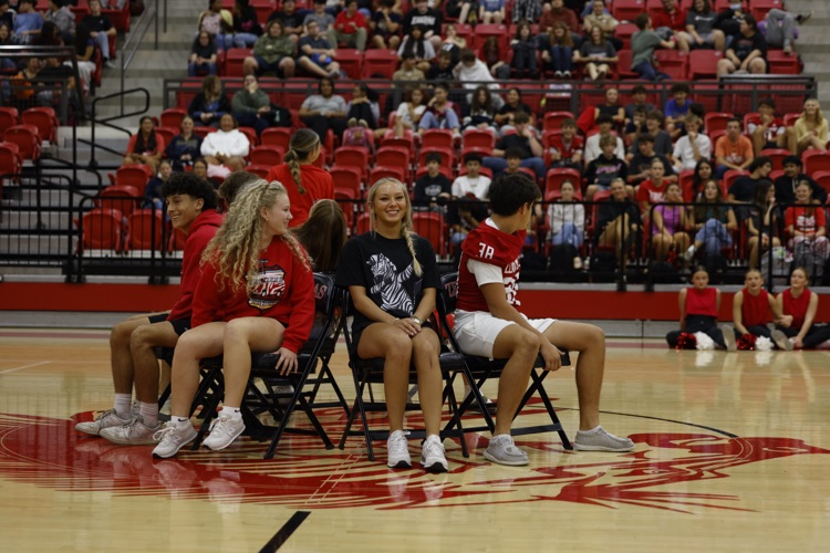 kids sitting in chairs