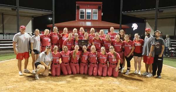 softball team in red uniforms