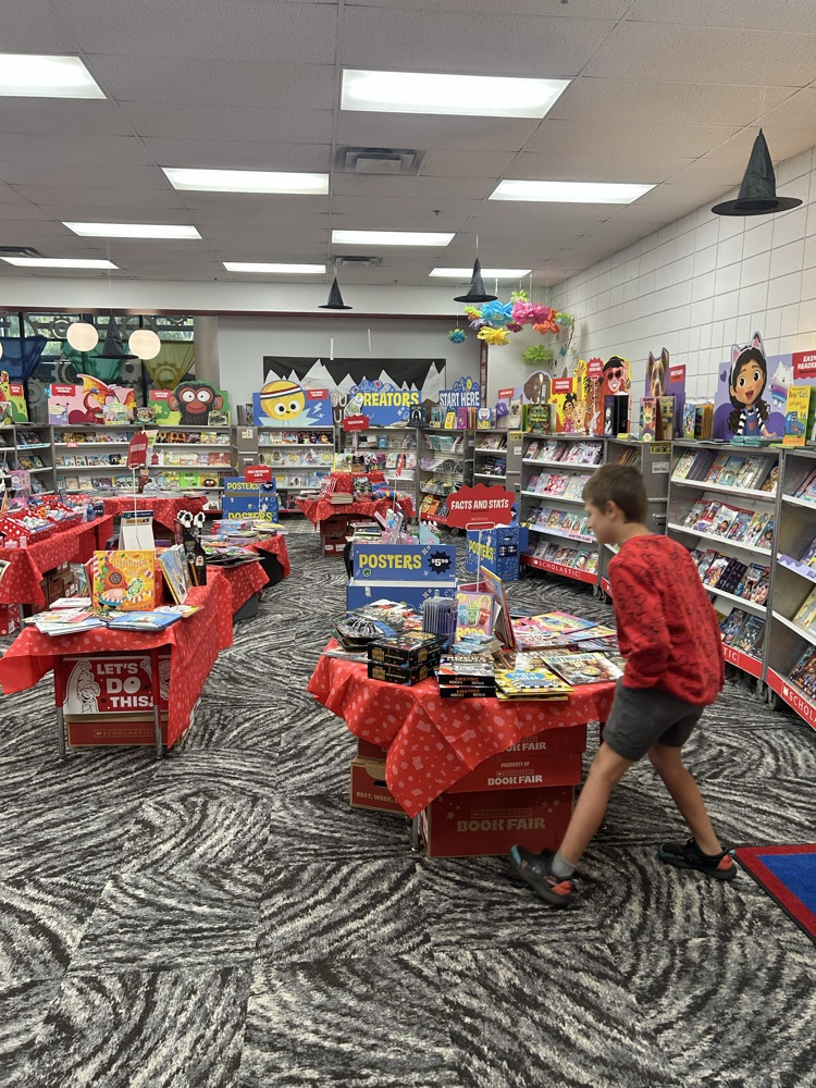 student shopping book fair