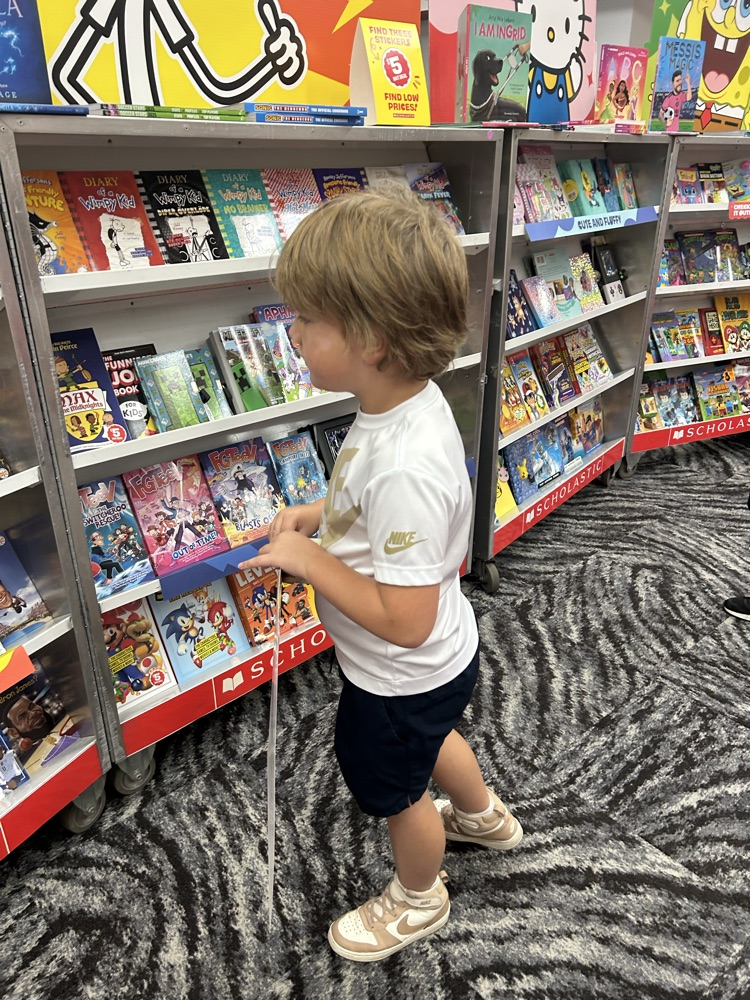 student shopping book fair