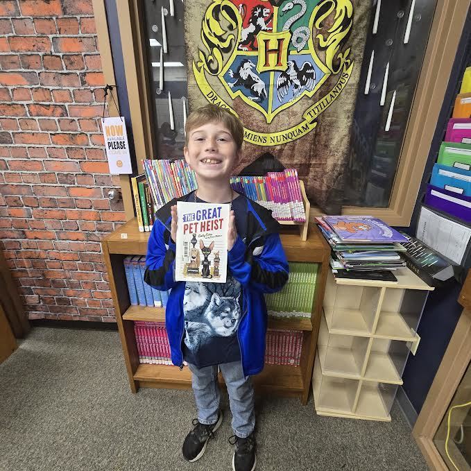 Student holding a book