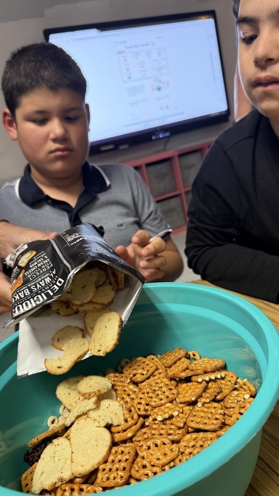 students making trail mix