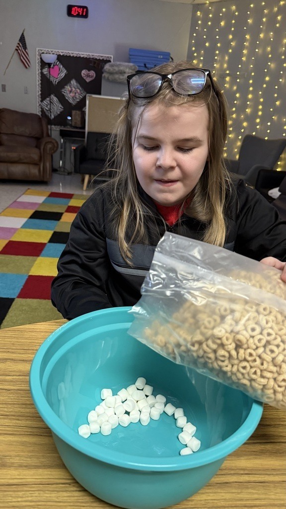 students making trail mix