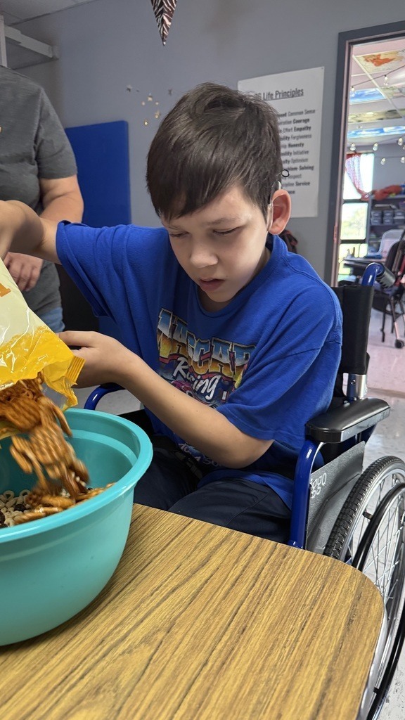 students making trail mix
