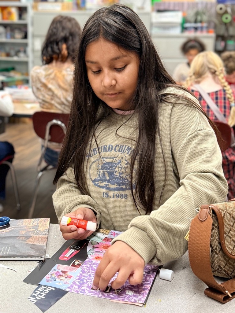 students working on their collages