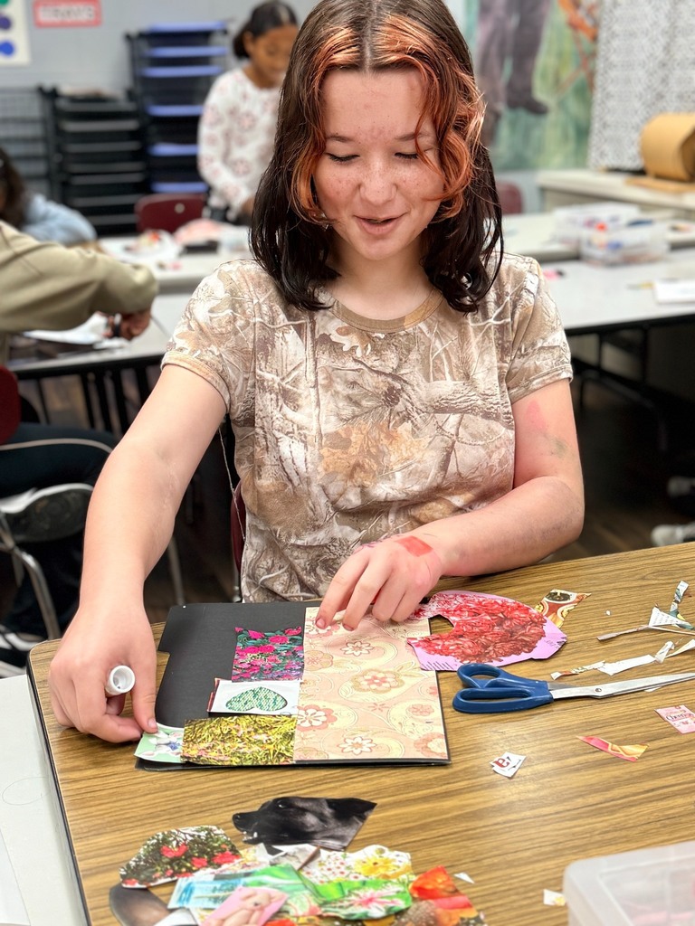 students working on their collages