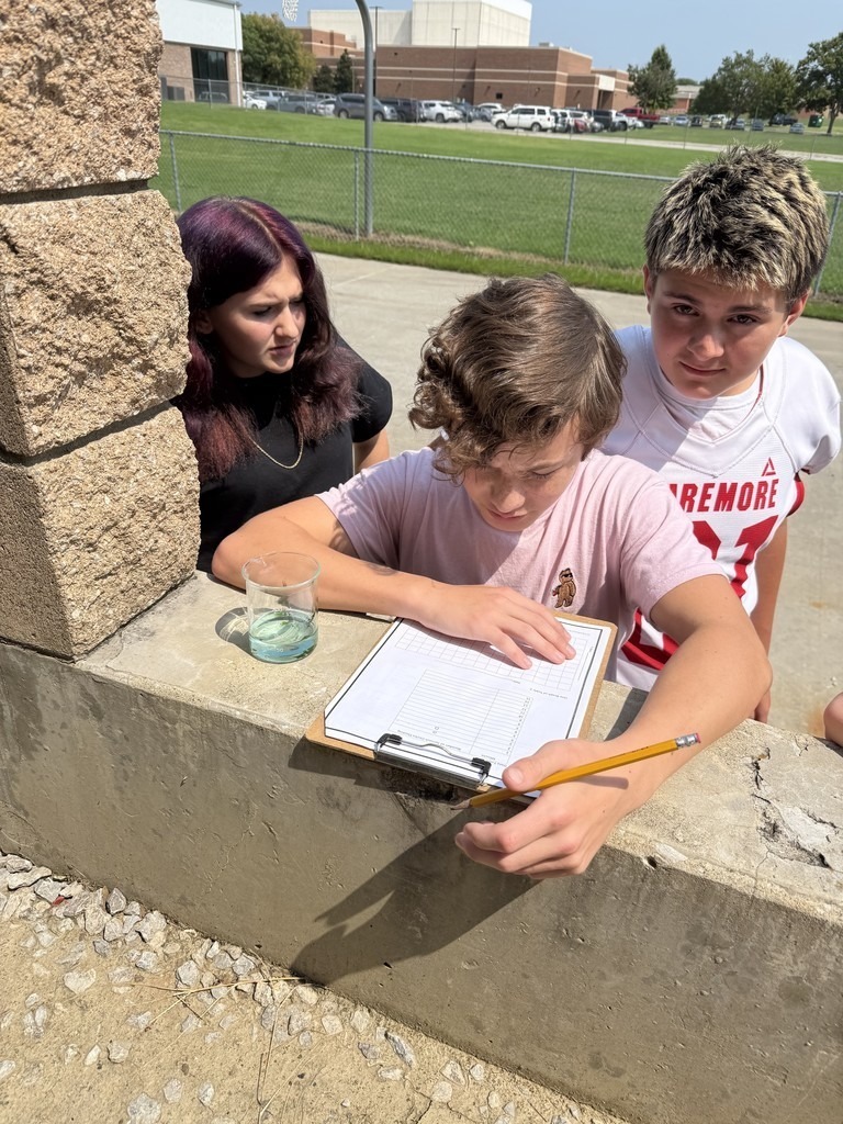 junior high students doing science