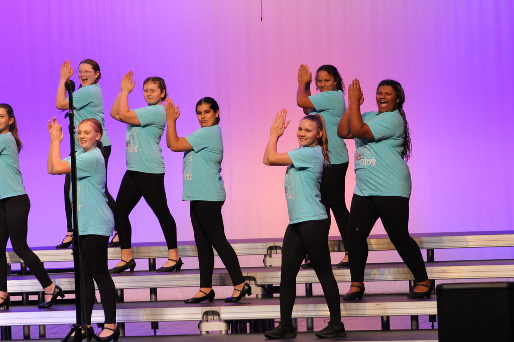 Spark Show choir clapping and giving the energy at their concert