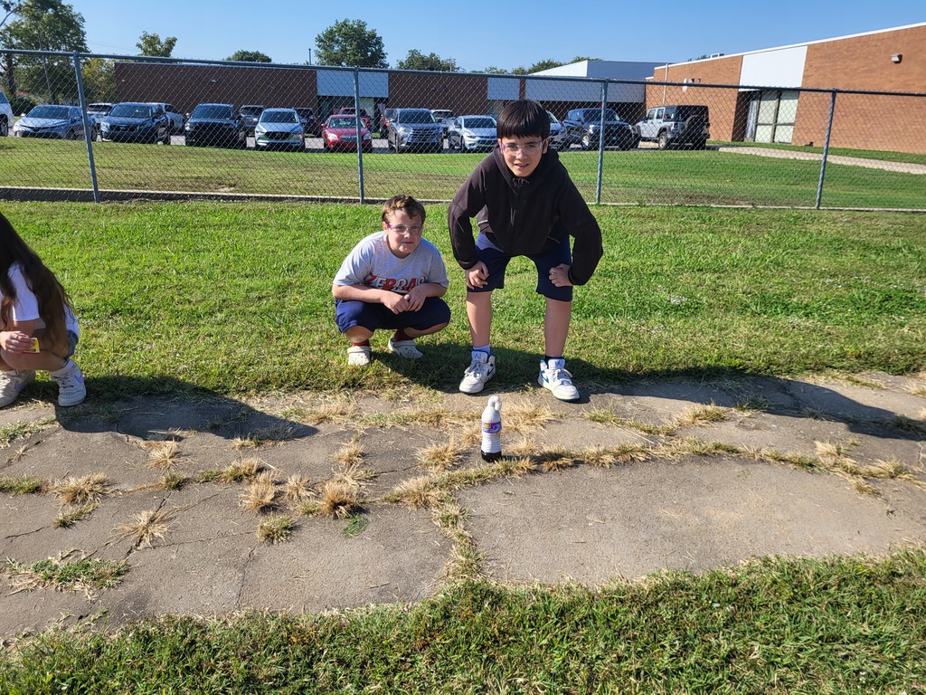 Students smiling with elephant toothpaste