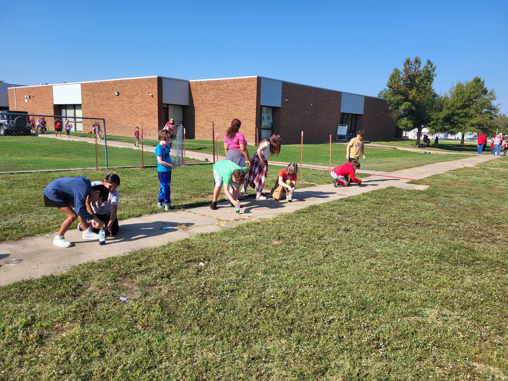 Students smiling with elephant toothpaste