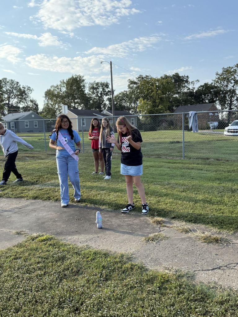 Students smiling with elephant toothpaste
