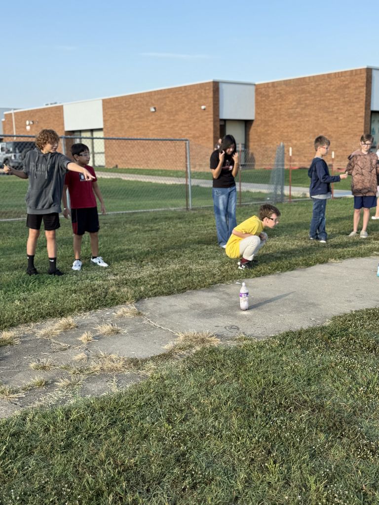 Students smiling with elephant toothpaste