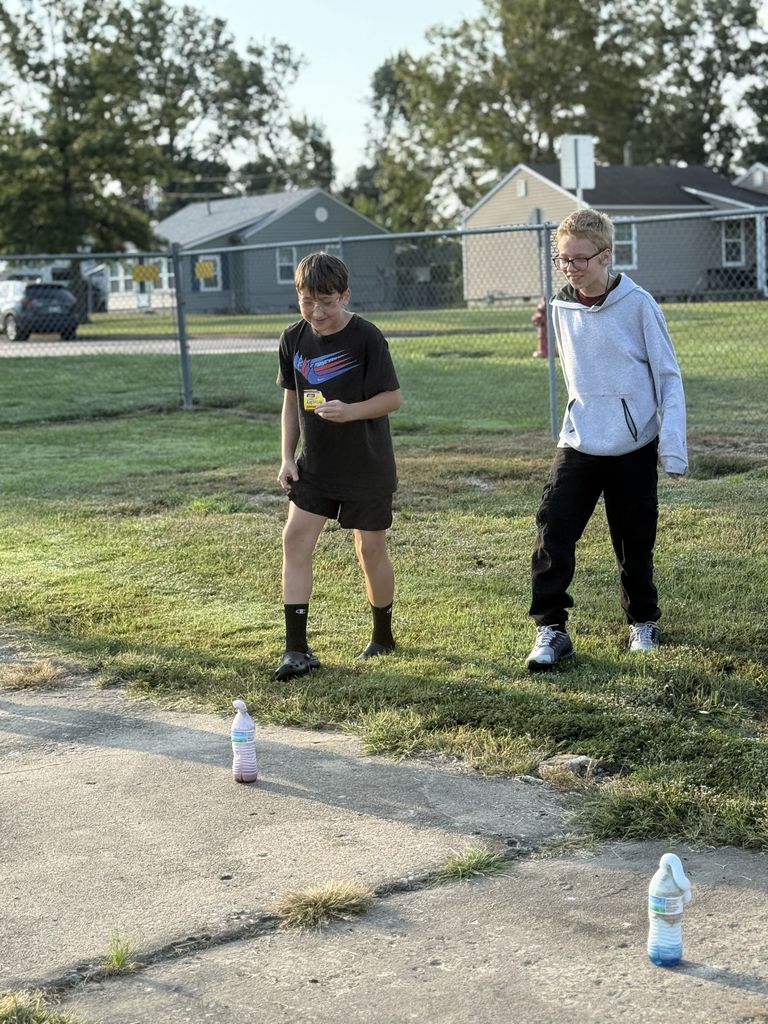 Students smiling with elephant toothpaste