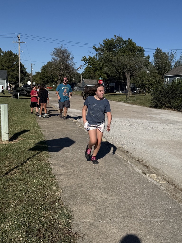 students running during running club