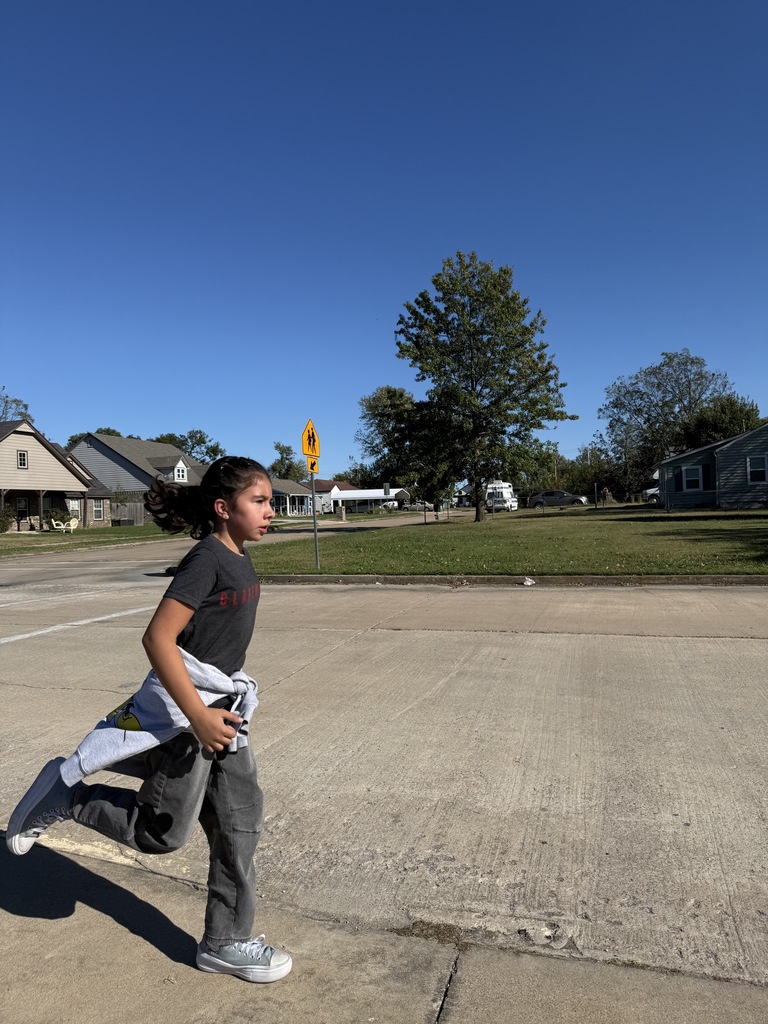 students running during running club