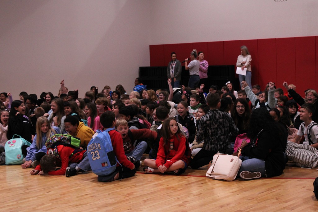 Girls cherring because they won the operation clean sweep