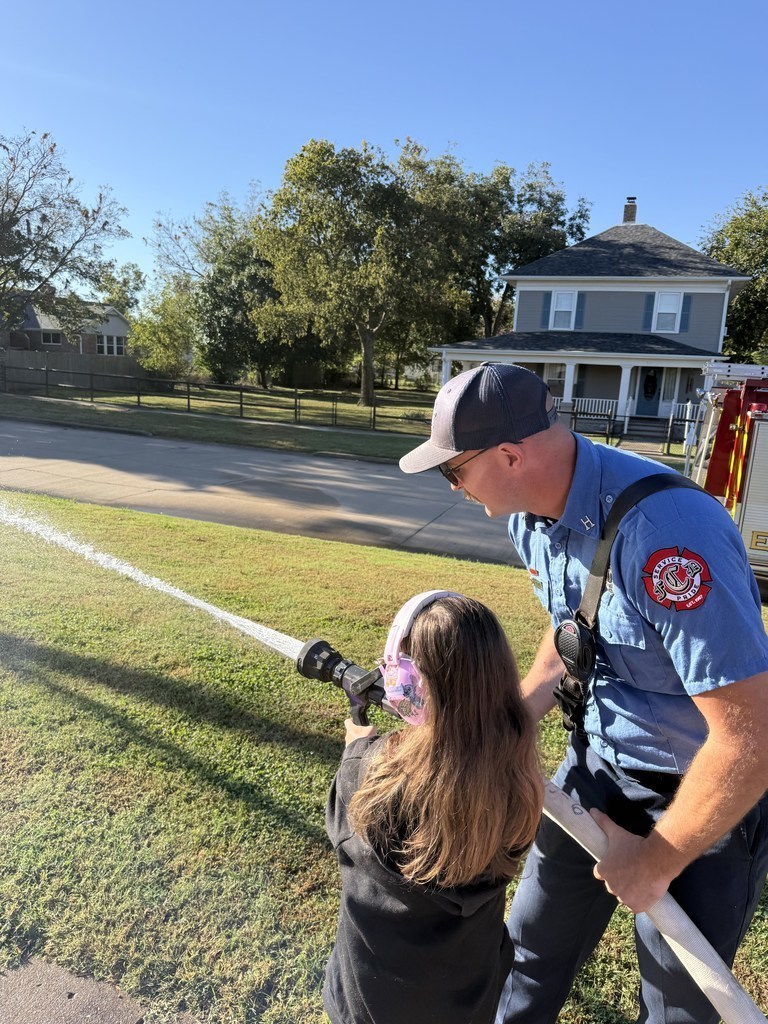 Students with Claremore Firefighters