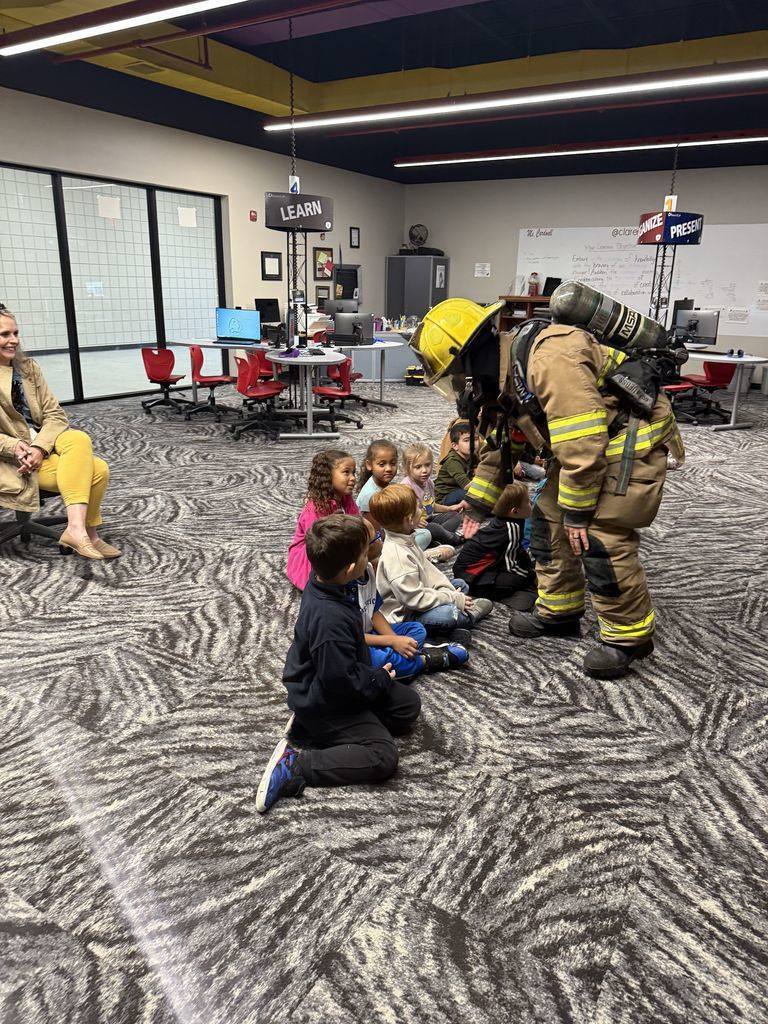 Students with Claremore Firefighters