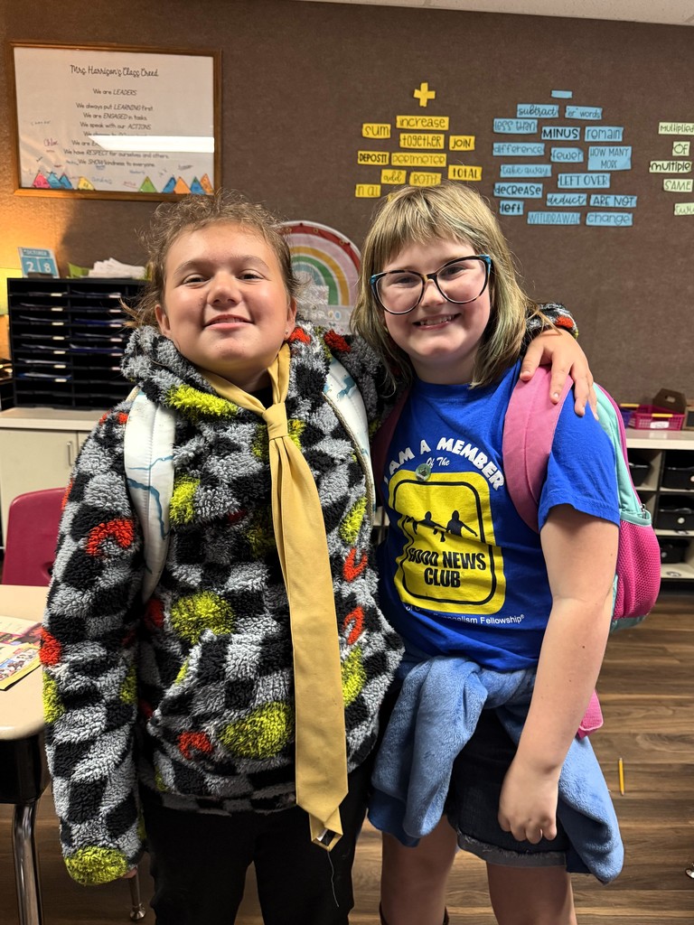 students wearing blue and a tie