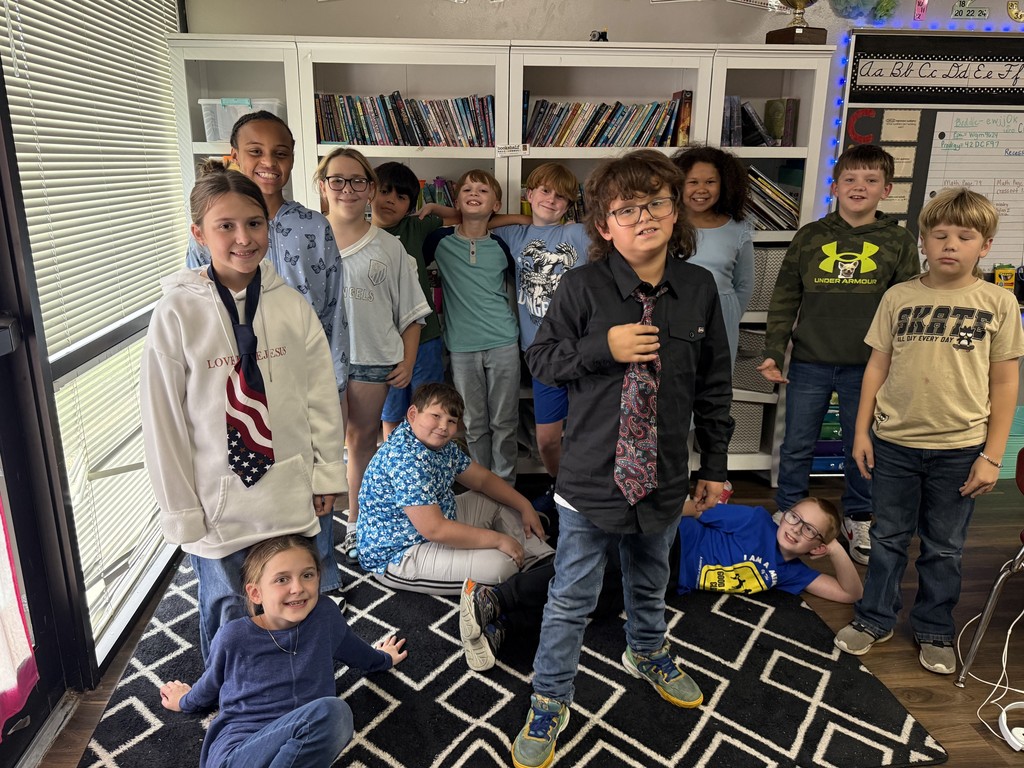 students wearing blue and a tie