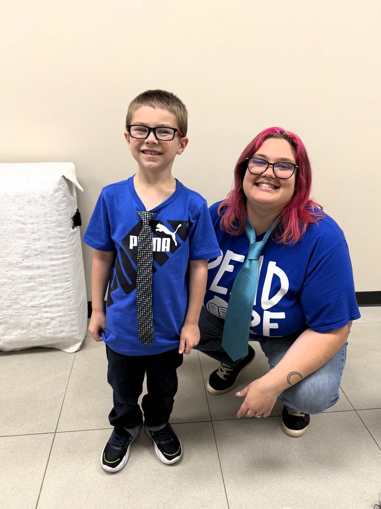 staff with student smiling