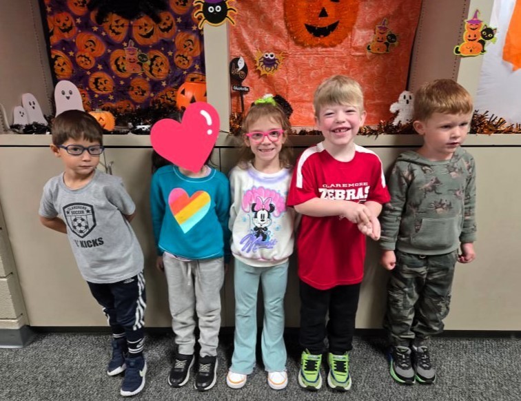 students wearing green and/or athletic gear