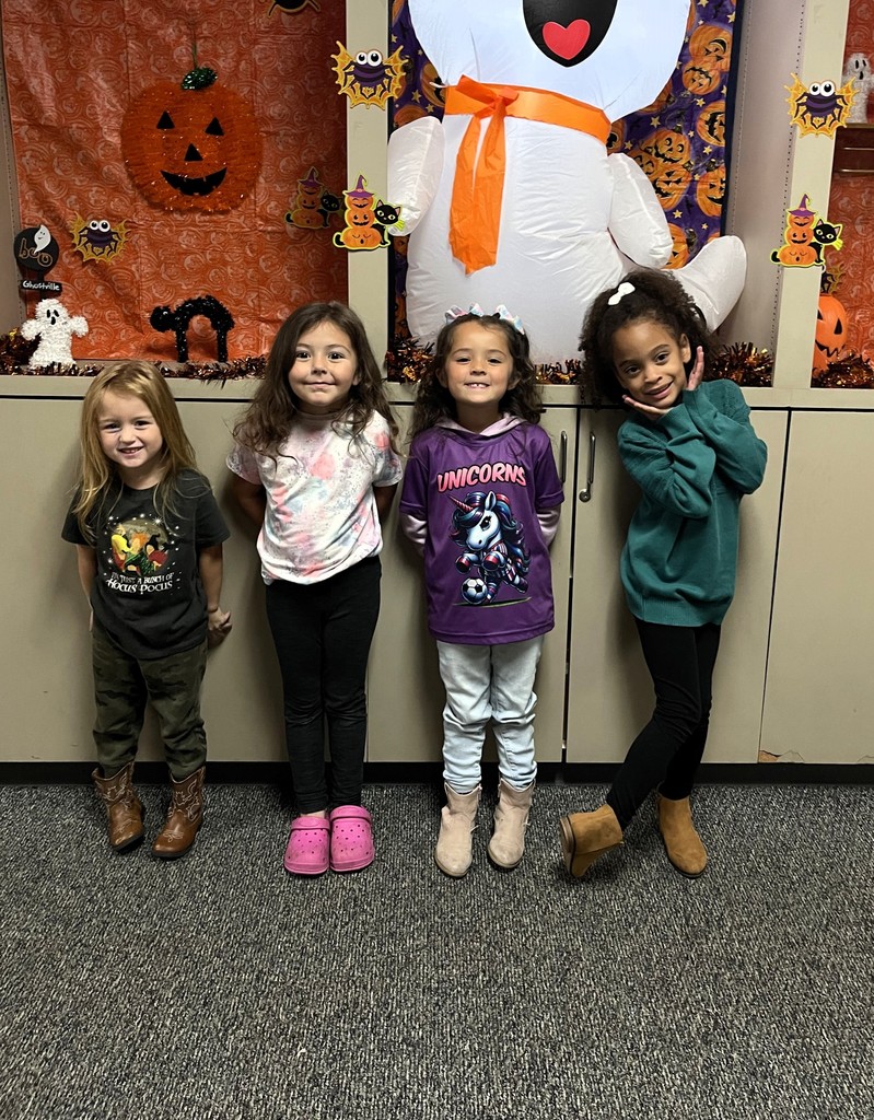 students wearing green and/or athletic gear