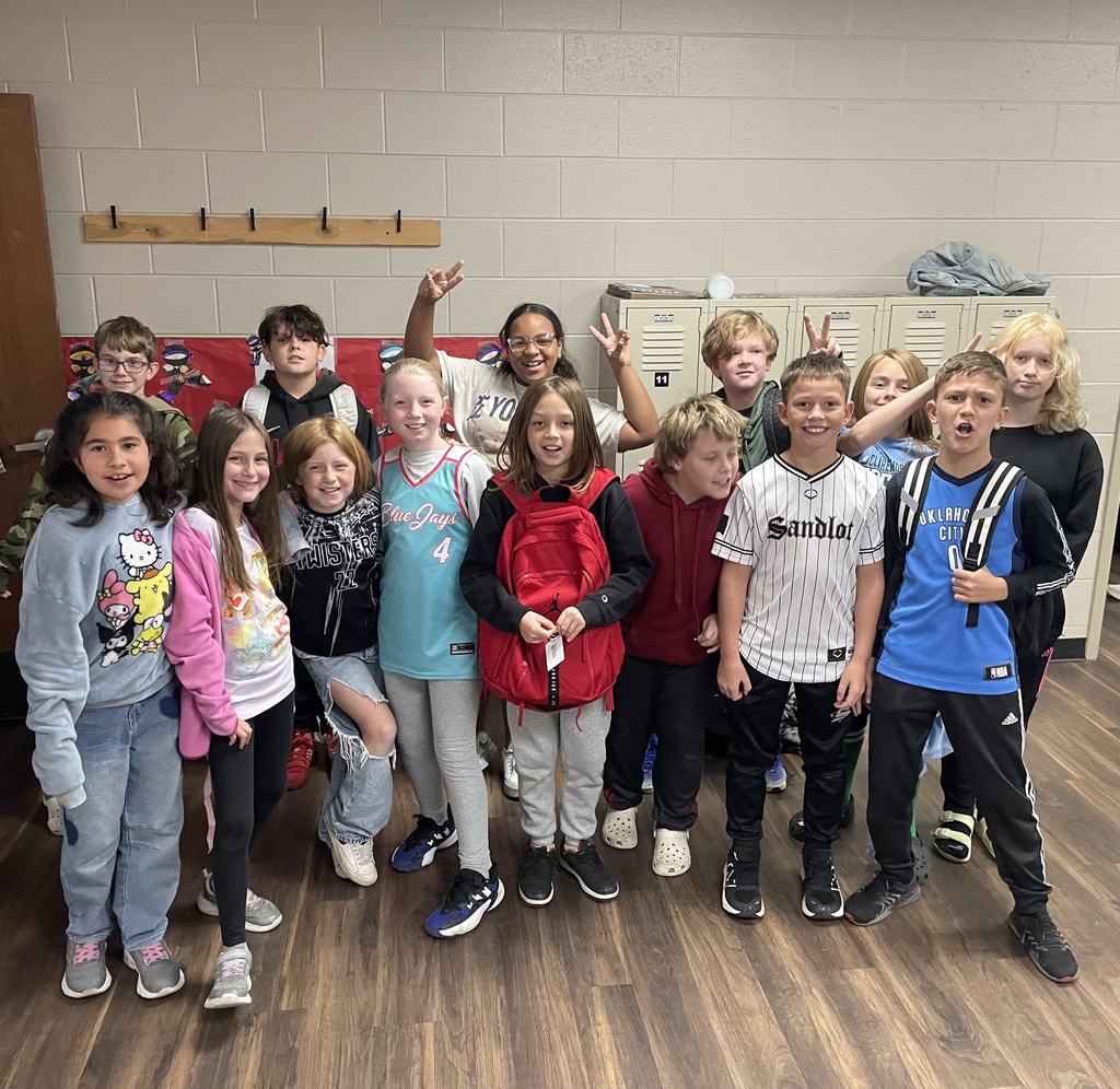 students wearing green and/or athletic gear