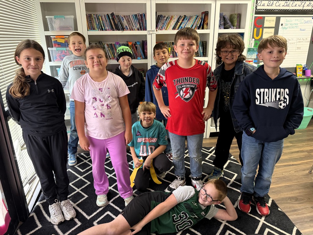 students wearing green and/or athletic gear