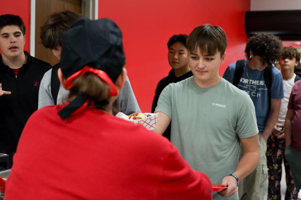 High School Student in line for baked potato