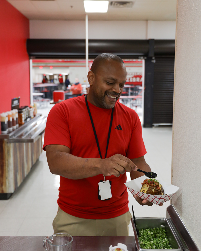 High school staff member with their baked potato