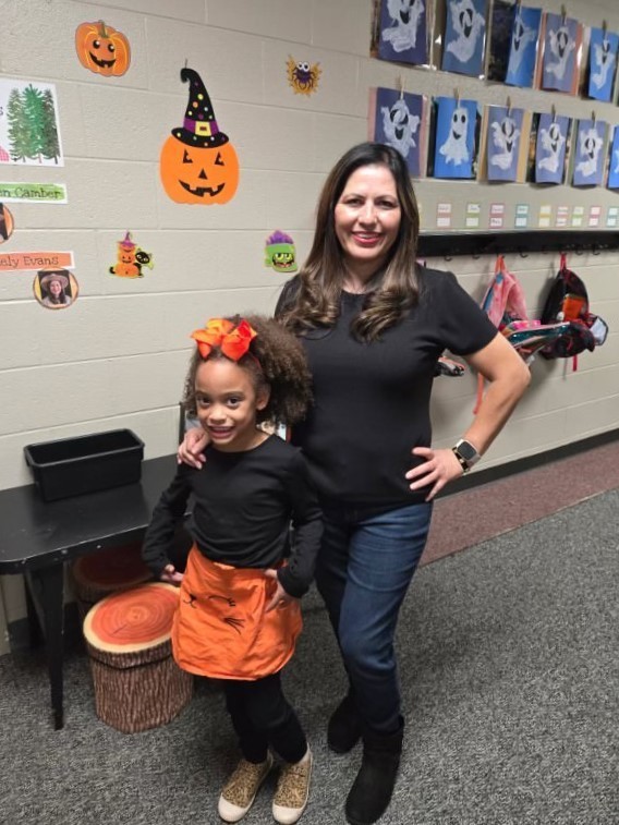 staff and student wearing black