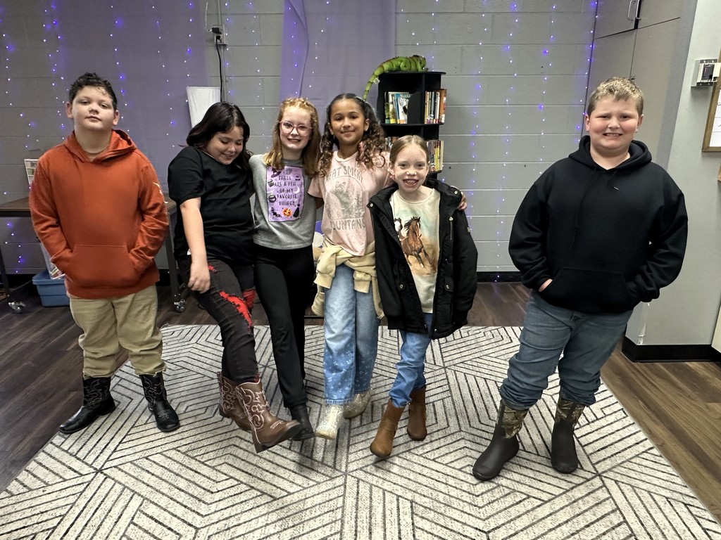 students wearing black or boots