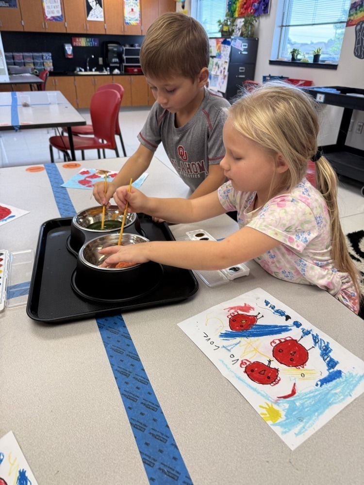 students working on art projects