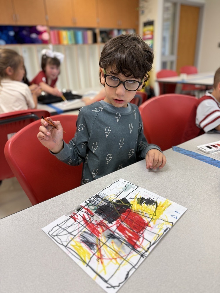 students working on art projects