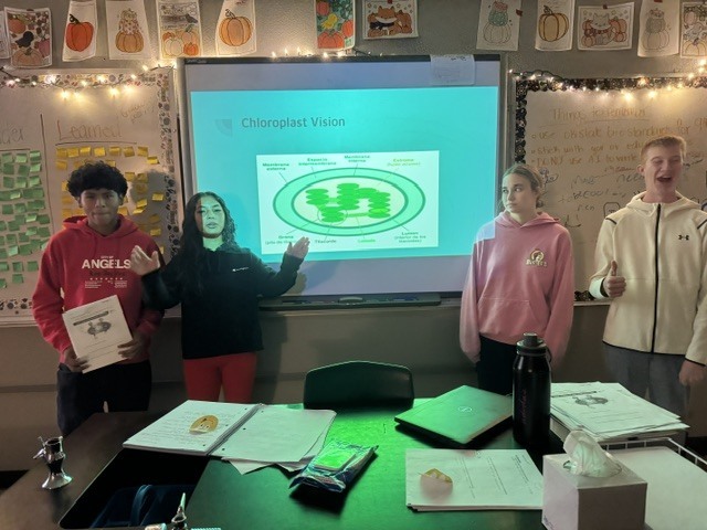 In Mrs. Lutz’s biology class, students have been working on a project that turns the traditional classroom upside down. Each group was randomly assigned a stage of photosynthesis, tasked with learning all about their assigned step, and then creating a lesson to teach the rest of the class.  Students quickly learned that teaching isn’t as easy as it looks—but they rose to the challenge and had fun in the process. This hands-on approach helped students take ownership of their learning and see just how much they’re capable of when they become the teachers!