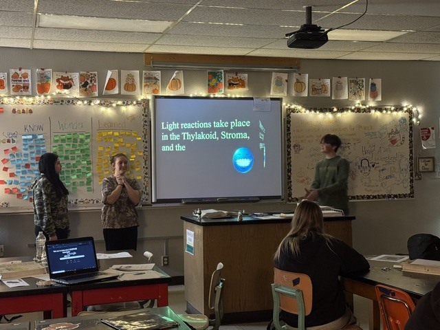 In Mrs. Lutz’s biology class, students have been working on a project that turns the traditional classroom upside down. Each group was randomly assigned a stage of photosynthesis, tasked with learning all about their assigned step, and then creating a lesson to teach the rest of the class.  Students quickly learned that teaching isn’t as easy as it looks—but they rose to the challenge and had fun in the process. This hands-on approach helped students take ownership of their learning and see just how much they’re capable of when they become the teachers!