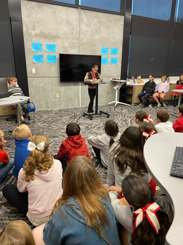 student giving speech to peers