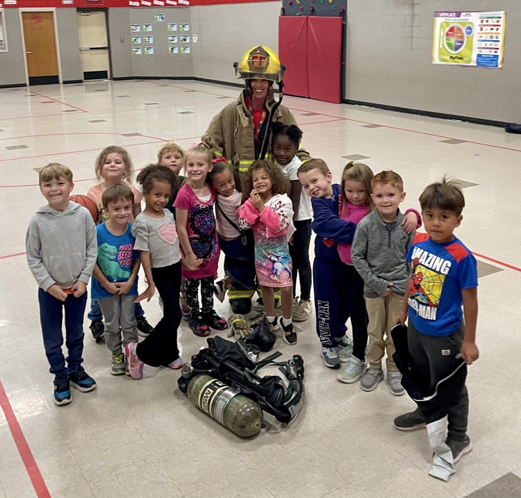 students with fireman 