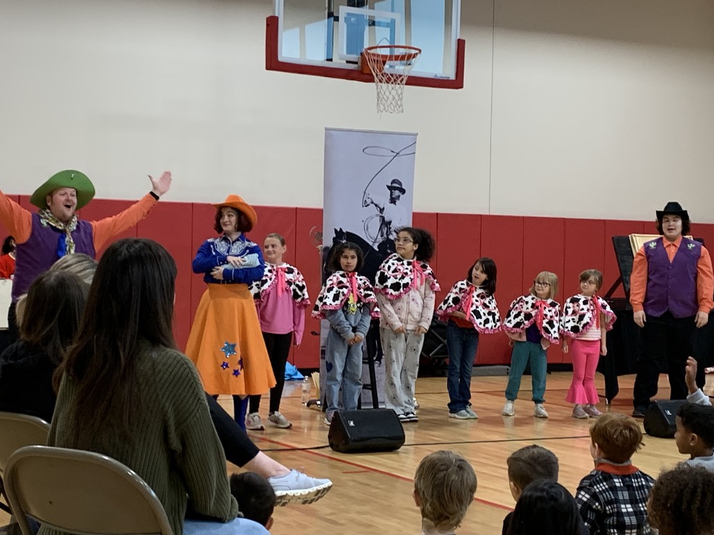 Students dressed up in black and white capes as part of the show.  