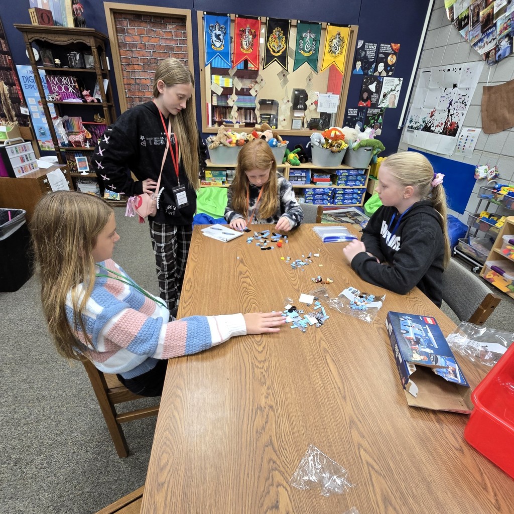 students building lego car
