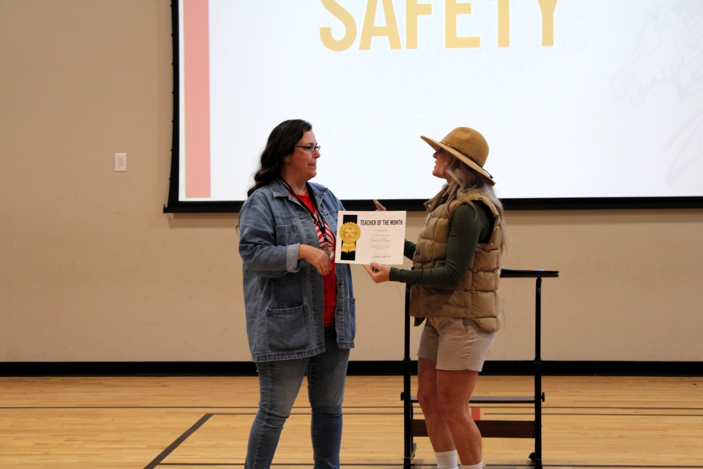 Ms. Fay presenting award to Ms. Massey