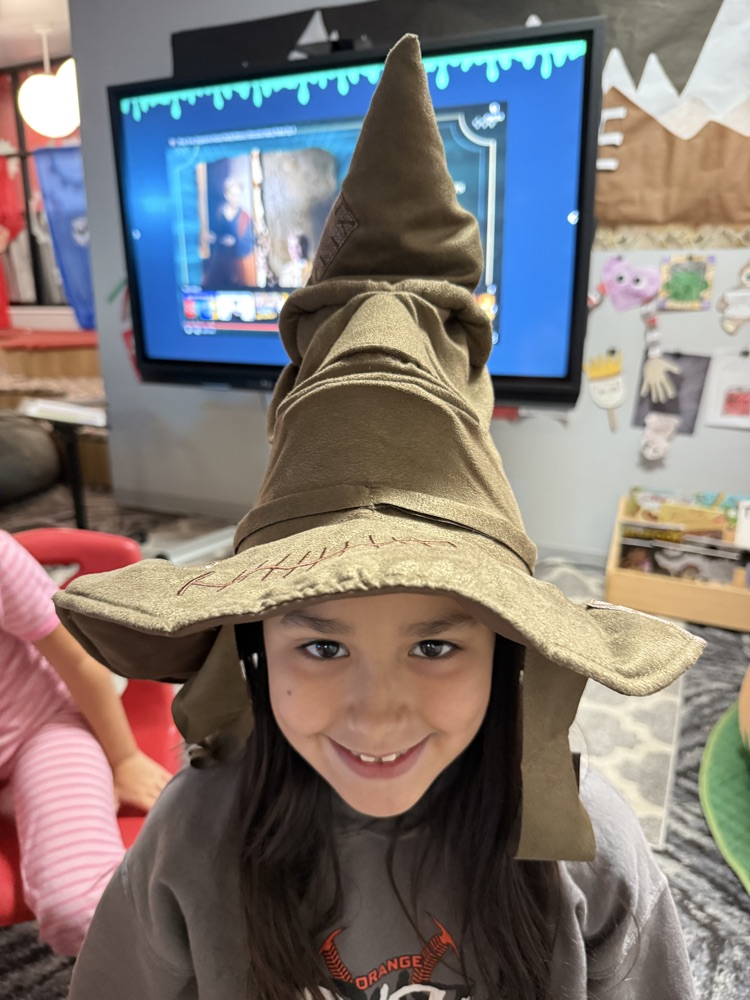 students in hogwarts hats 