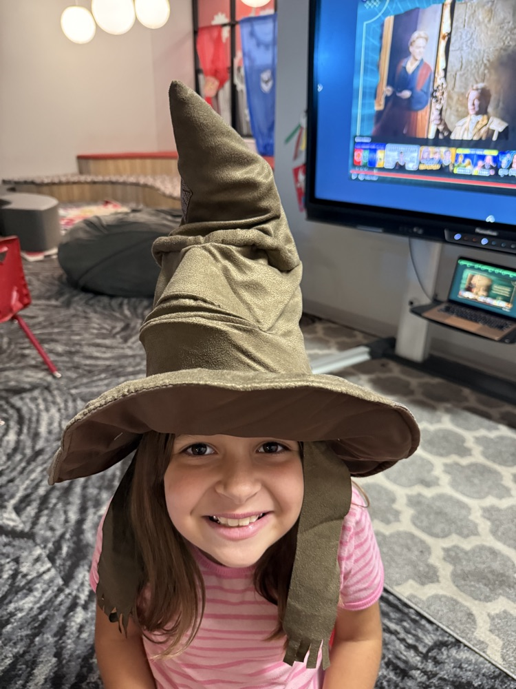 students in hogwarts hats 